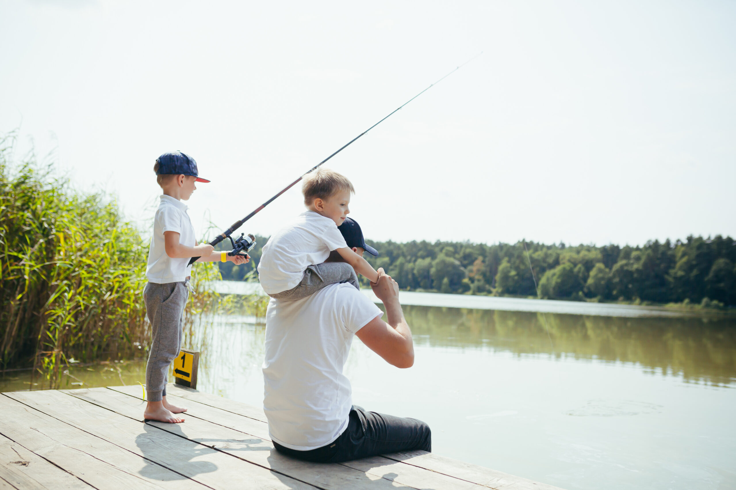 family fishing on a lake in central florida