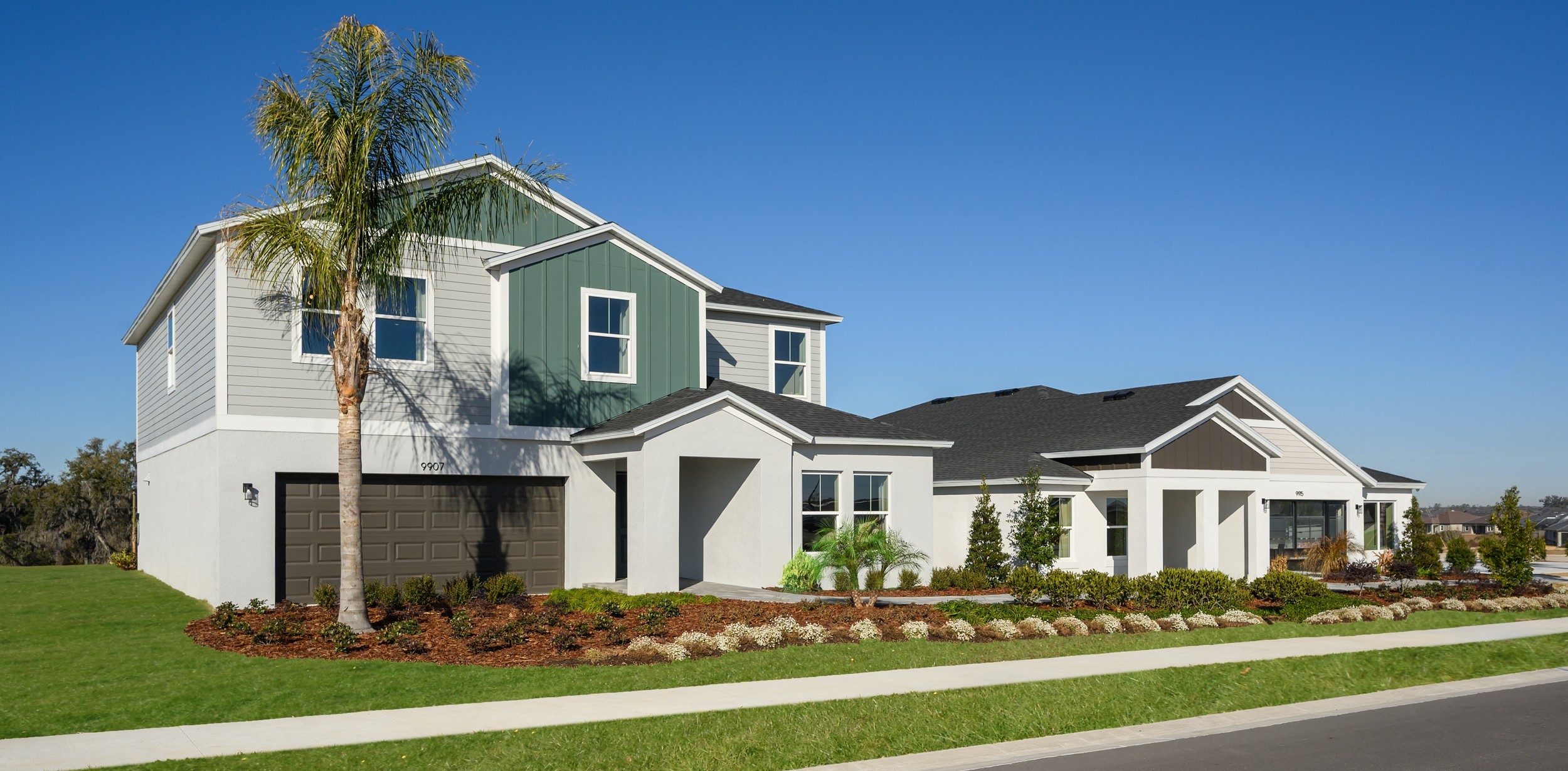 Casa Fresca Homes in Florida featuring modern new construction homes with palm trees and blue sky
